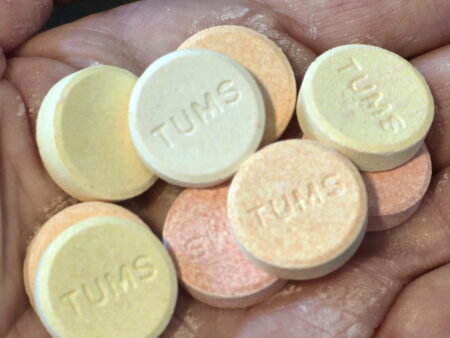 tums antacids in a palm