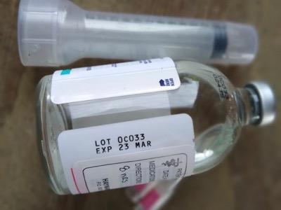 jar of banamine and syringe