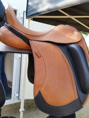 brown and black two tone dressage saddle