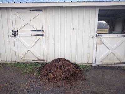 compost covering water line into barn