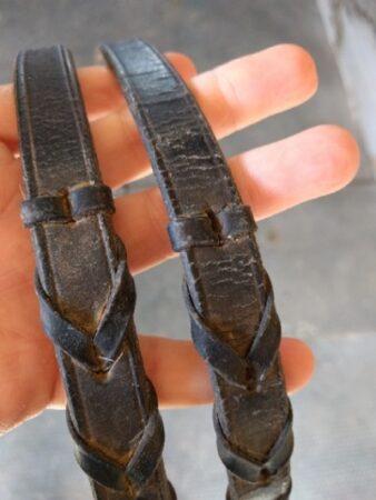 dried out laced leather reins