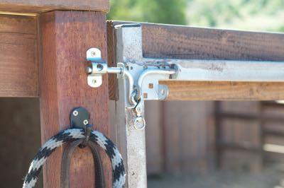 slide lock for horse stall or paddock with halter hook nearby