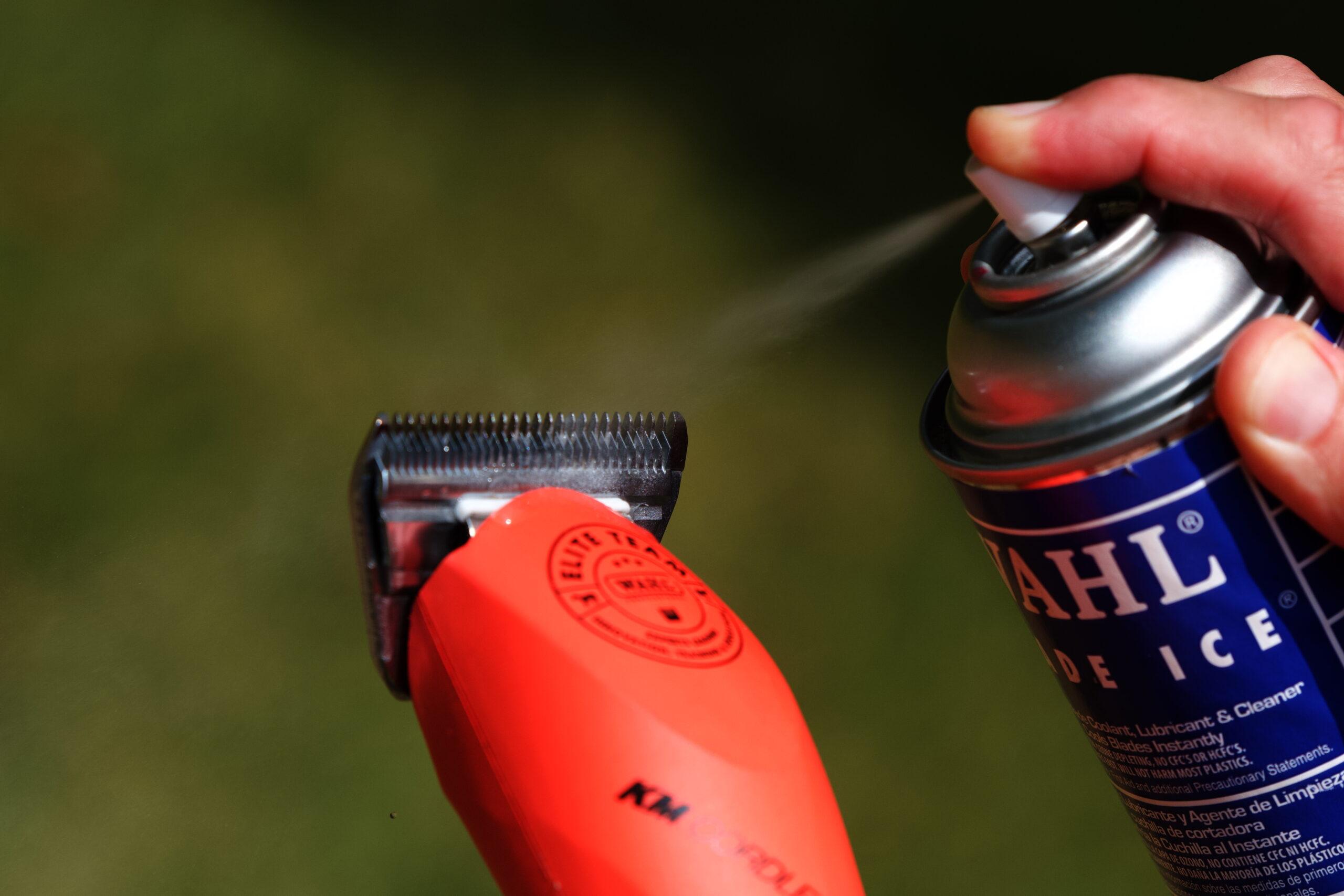 clipper coolant spray on a KM cordless clipper using a wide blade