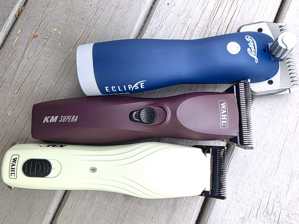 three horse clippers, a set of shears and two regular body clippers