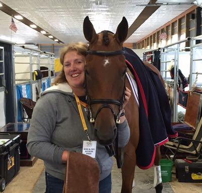 emma ford hugging a horse's neck