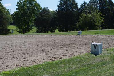 sandy outdoor horse riding arena