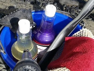 horse bathing supplies in a bucket