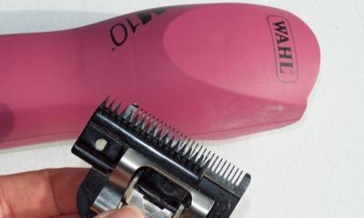 pink km10 clippers with clipper blade showing comb and cutter