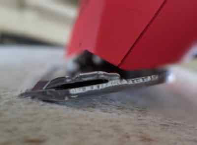 up close of number 10 blades on a gray horse