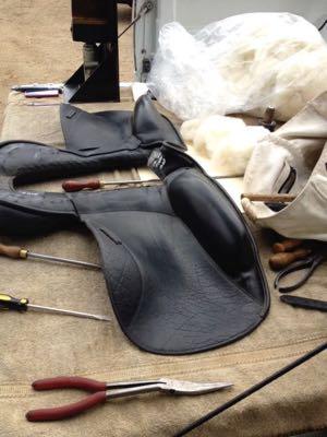 saddle after being taken apart for flocking