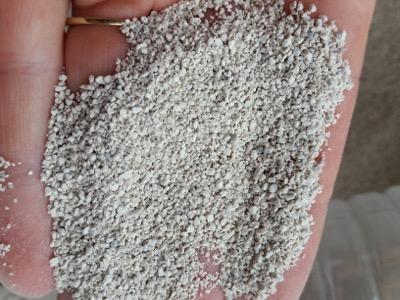 zeolite granules in a hand