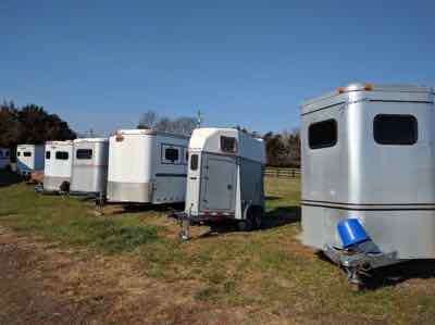 row of horse trailers lined up
