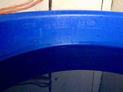 measurement marks inside a muck tub