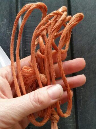 pile of orange baling twine
