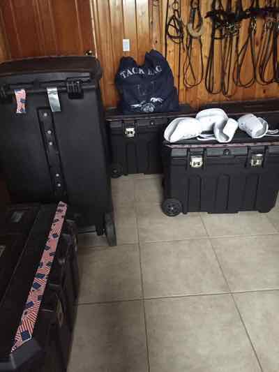 tack room with trunks and bags