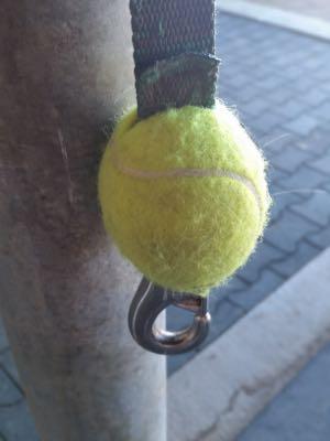 tennis-ball-on-cross-ties