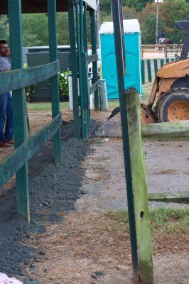 tractor making a trench for water