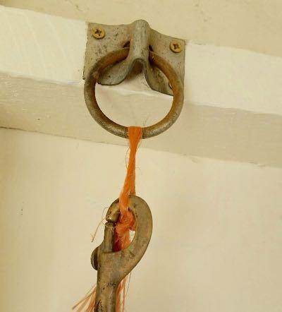 baling twine on cross tie attachment for safety