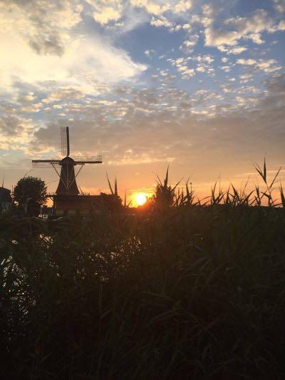 sunset in holland with windmill