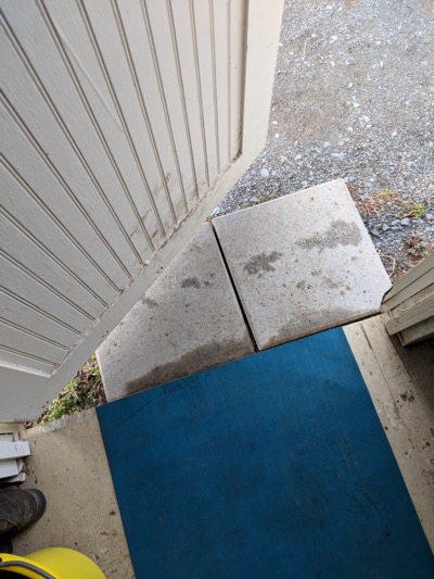 yoga mat as a door mat in a tack room