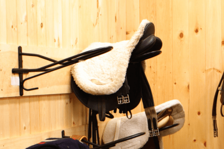 saddle racks in a tack room