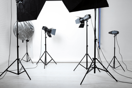 photography studio setup with lights and backdrop